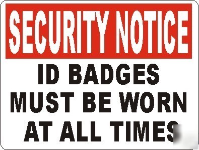 Security notice id badges must be worn all times sign