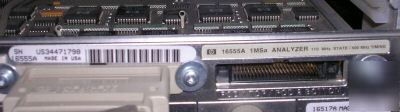 Hp 16702A logic analyzer mainframe disply 2 cards used