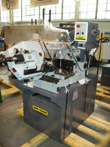 New hyd-mech pivot style double mitering bandsaw dm-10