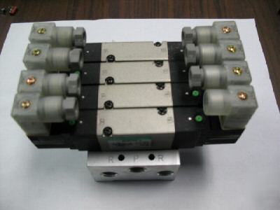 Four ckd 4KKB229-l solenoids on manifold - nos