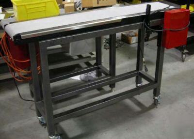 Packaging conveyor, heavy-duty