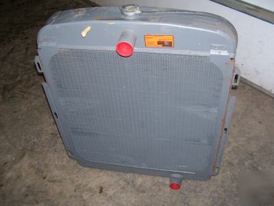New idea uni-harvester nos radiator part # 707434