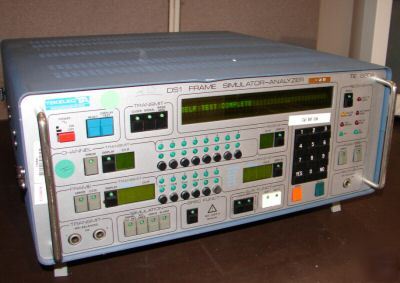 Tekelec TE820A DS1 frame simulator/analyzer w/modules 